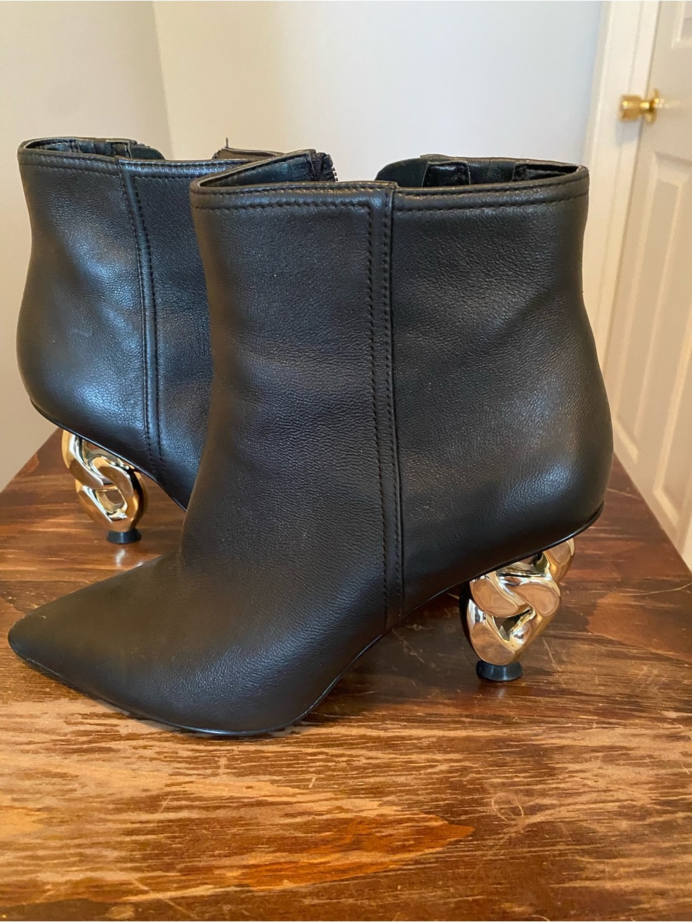 White House Black Market Black Leather Ankle Boots with Sculptural Gold Heels